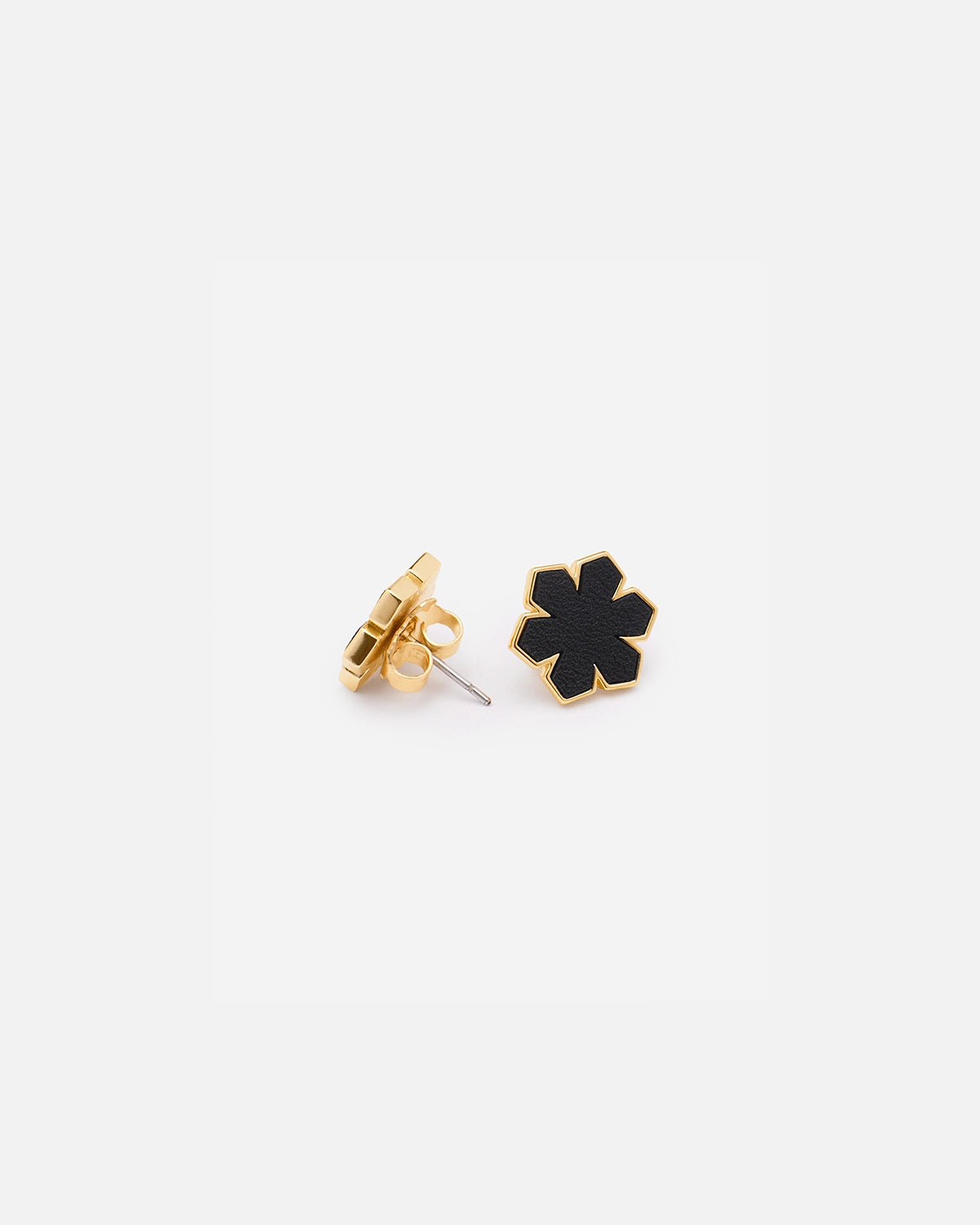 The Leather Fusion Kalmus Earrings are crafted from the finest 14 karat plated gold adorned with butter-soft glove leather at the center, RHANDERS.