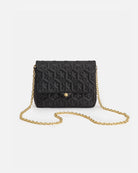 Handcrafted handbag for women in the color black. Made by RHANDERS. Gold-plated KALMUS and chains.