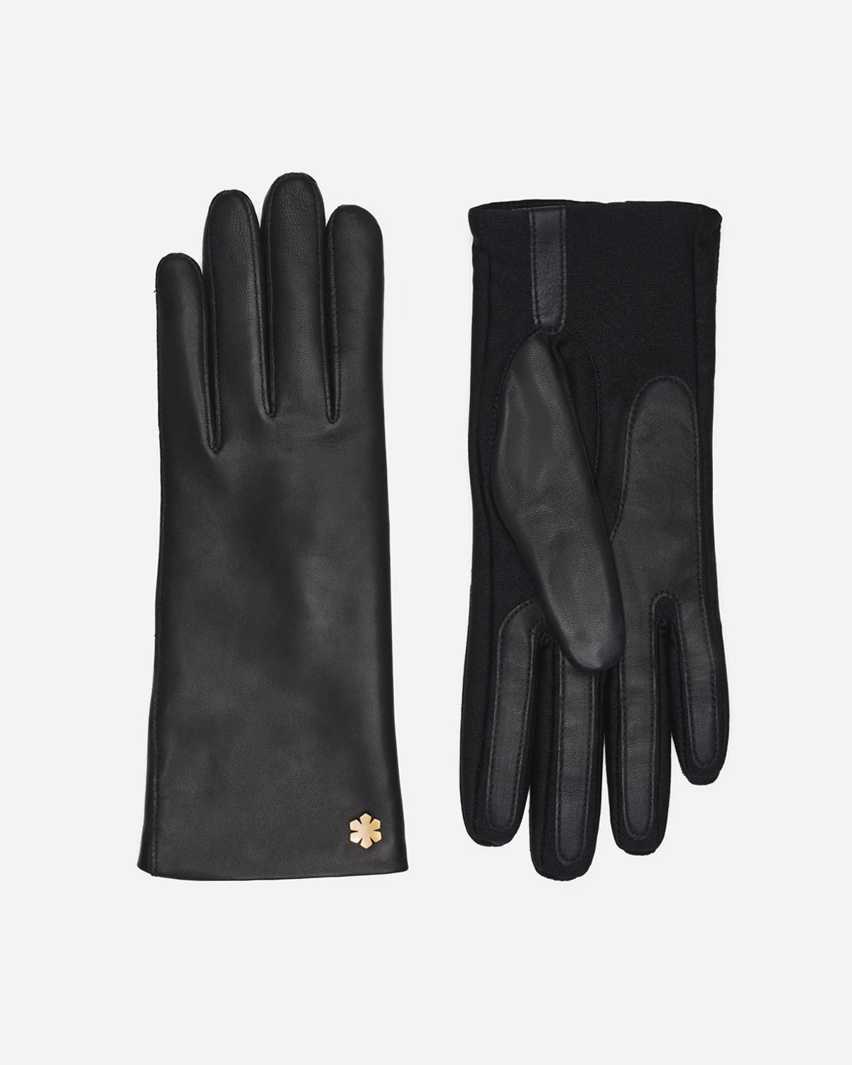 The classic Anna gloves comes in a one-size version crafted from lamb leather and Lycra panels on the underhand, adorned with a 14 gold-plated Kalmus flower, RHANDERS