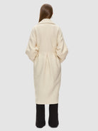 Crafted from soft, thick wool, the Tulip Coat - Wool from RHANDERS is tailormade with care and is detailed with double-breasted closure, discreet side pockets, and 14 karat gold-plated Kalmus buttons.