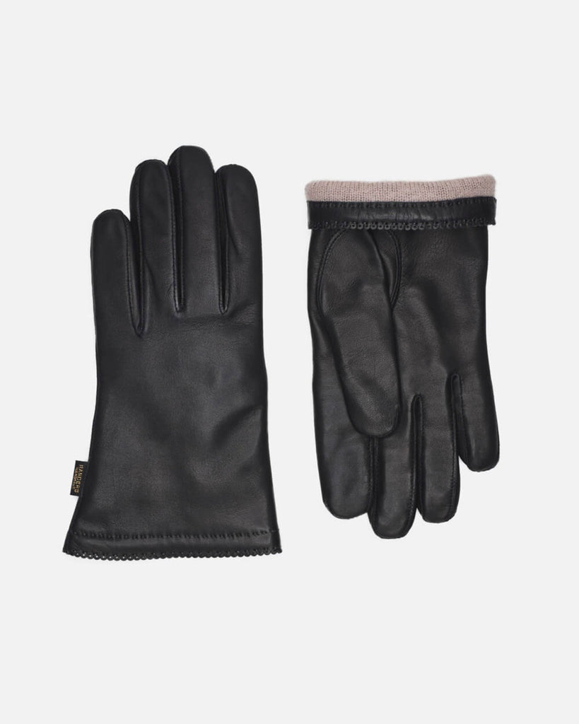 Black women's leather glove with warm wool-blend lining with a slight touch of nylon for strength and lifelong wear.