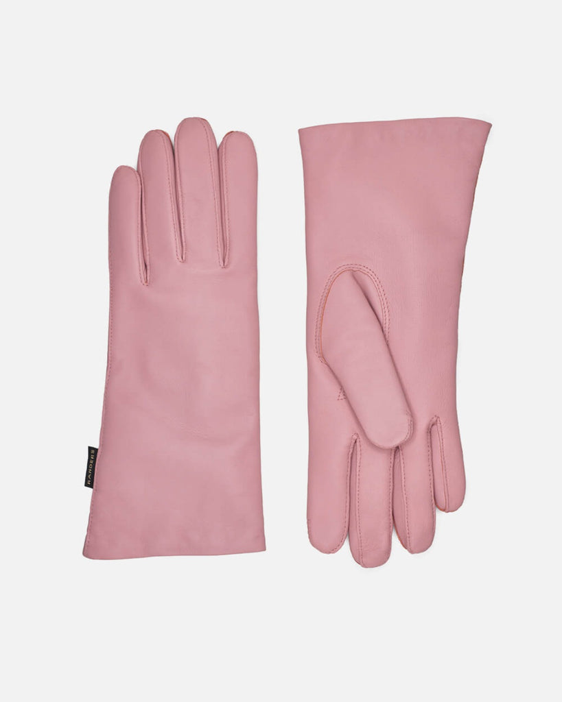Klassisk og tidløs læderhandske til kvinder med varmt uldfor i farven rosa.