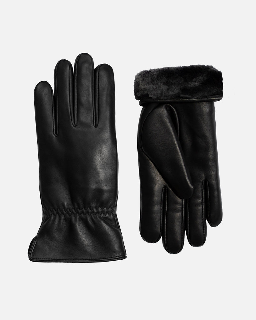 Warm and elegant leather glove for women with double-face long-haired lamb lining.