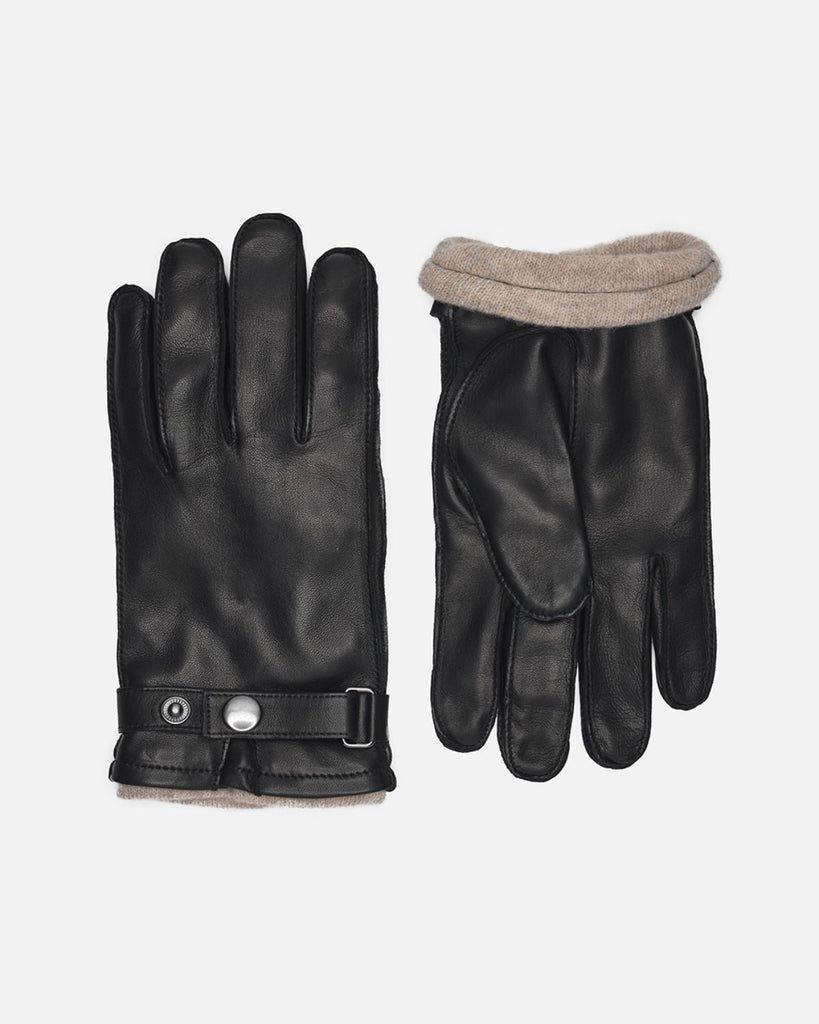 Men's leather gloves in black with warm wool-blend lining and strap wit press button from RHANDERS.