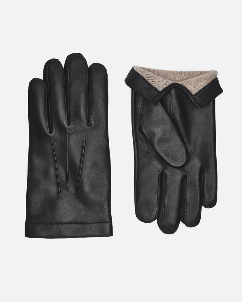 Klassisk herrehandske i sort lammeskind med varmt uldfor fra Randers Handsker.