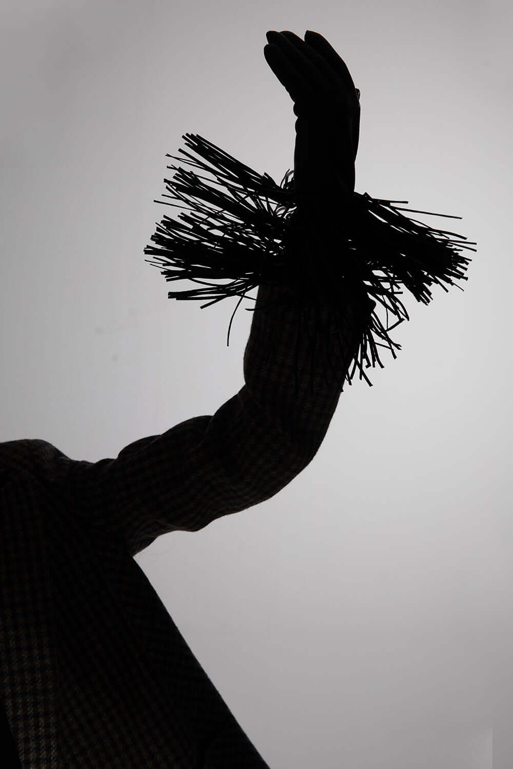 Extravagant female leather gloves with fringes from RHANDERS.