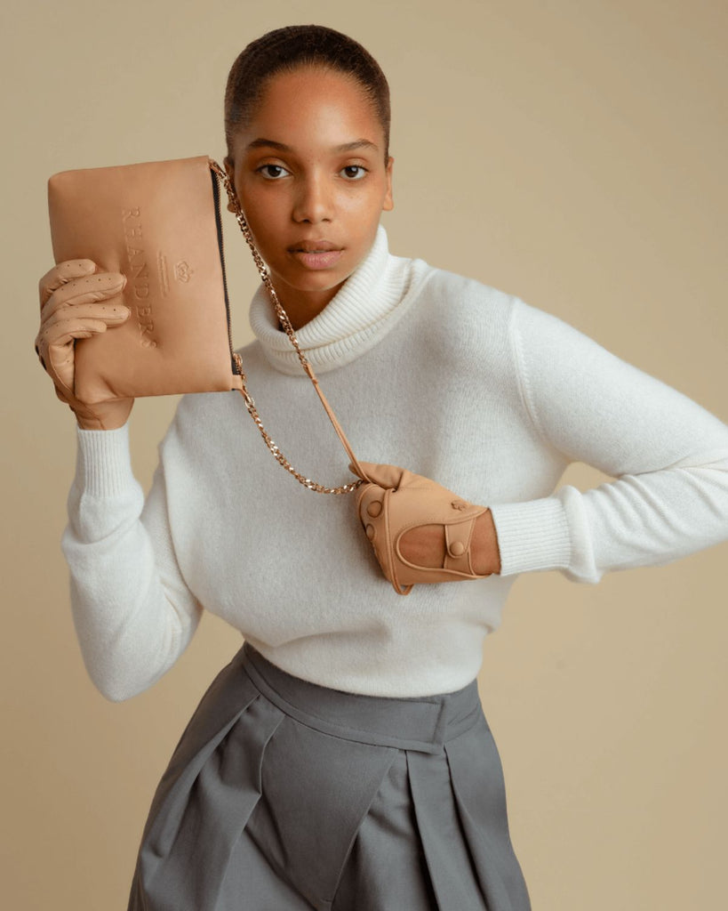 Simple and sophisticated camel women's leather pouch. Handcrafted at our atelier in Randers.