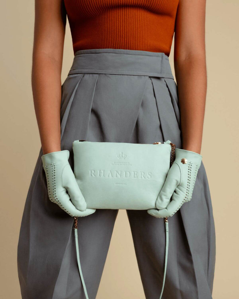 Classic and timeless leather pouch for women in the colour mint.