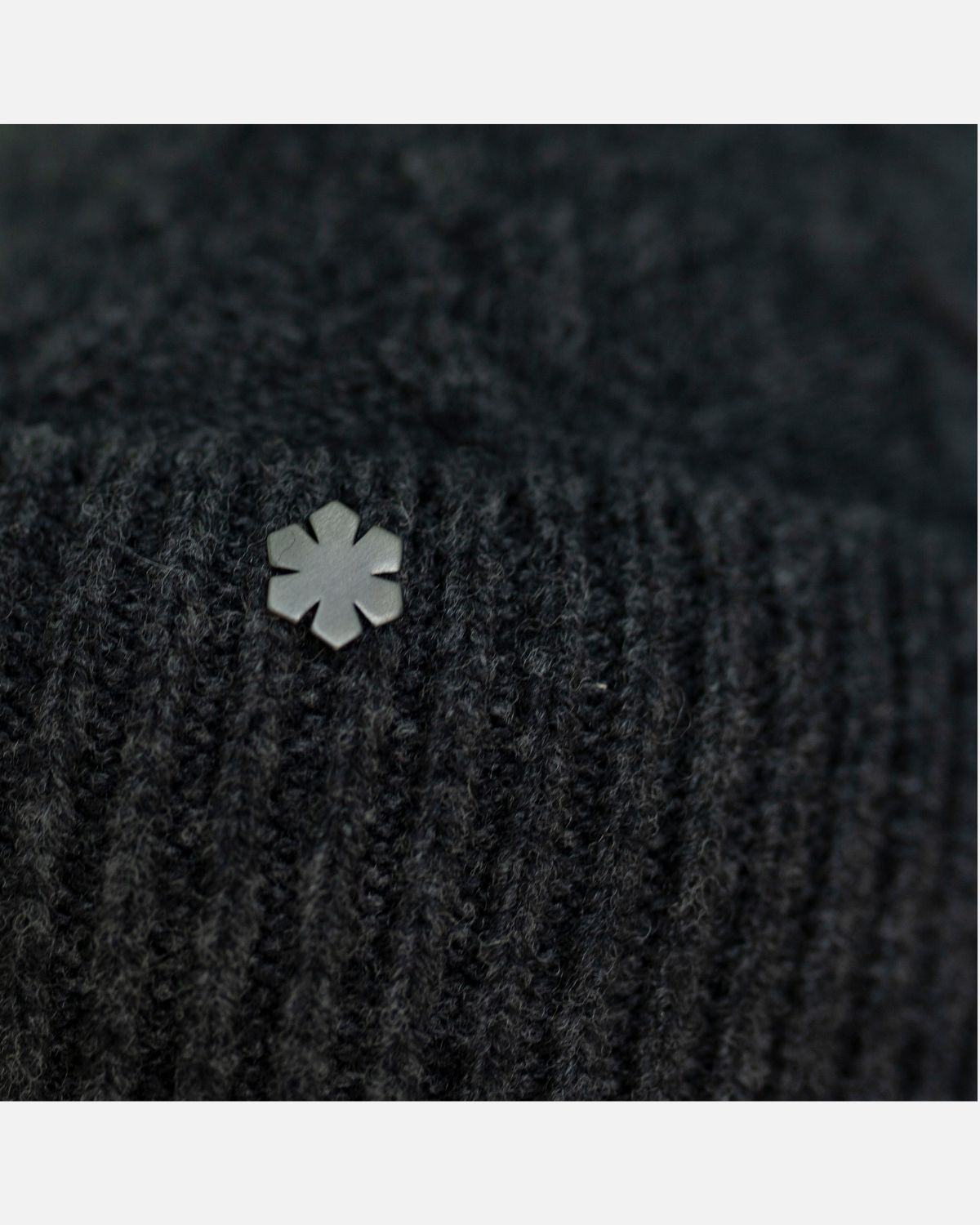 Warm and soft knitted wool beanie in the colour charcoal.