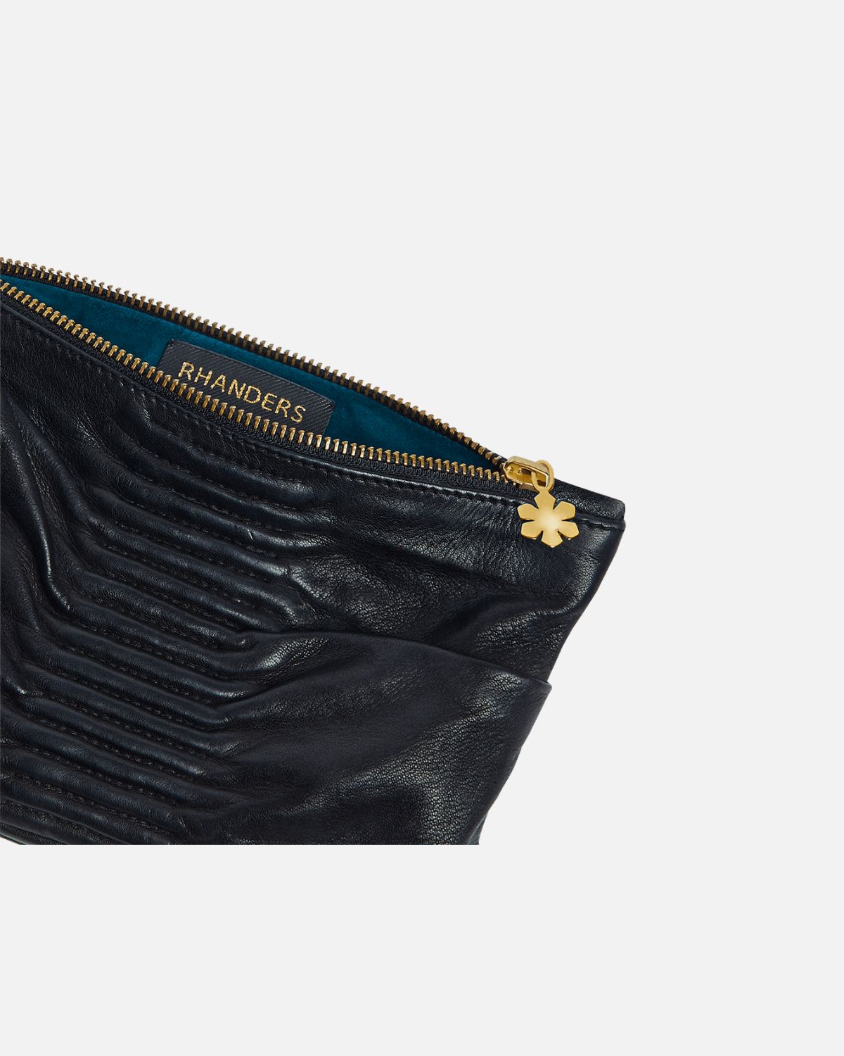 Unique and elegant black women's clutch. Designed by award winning designer and architect Lars Vejen.