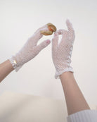 Unique female lace gloves in white from RHANDERS.