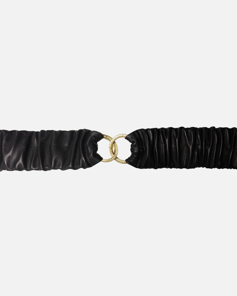 Bredt elastik damebælte med 2 guldbelagte spænder i farven sort. 