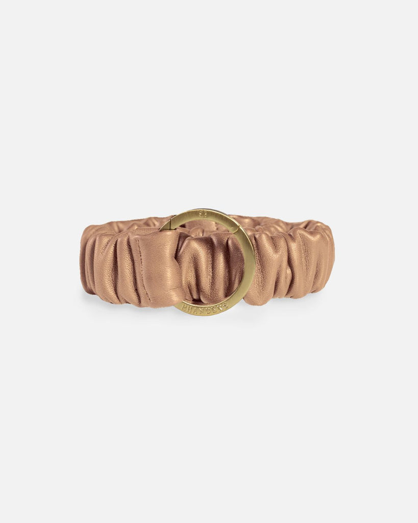 Elastic women's belt with gold buckle in the colour camel. Can be used in jeans, over the waist of a dress or as a strap for your bag.