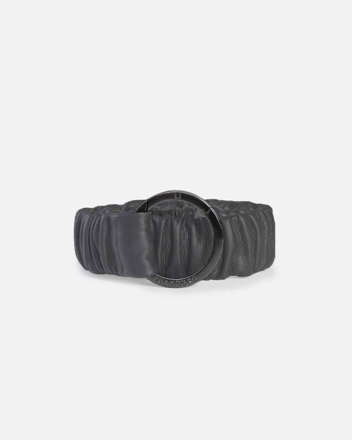 Elastic women's belt with in the colour grey. Can be used in jeans, over the waist of a dress or as a strap for your bag.