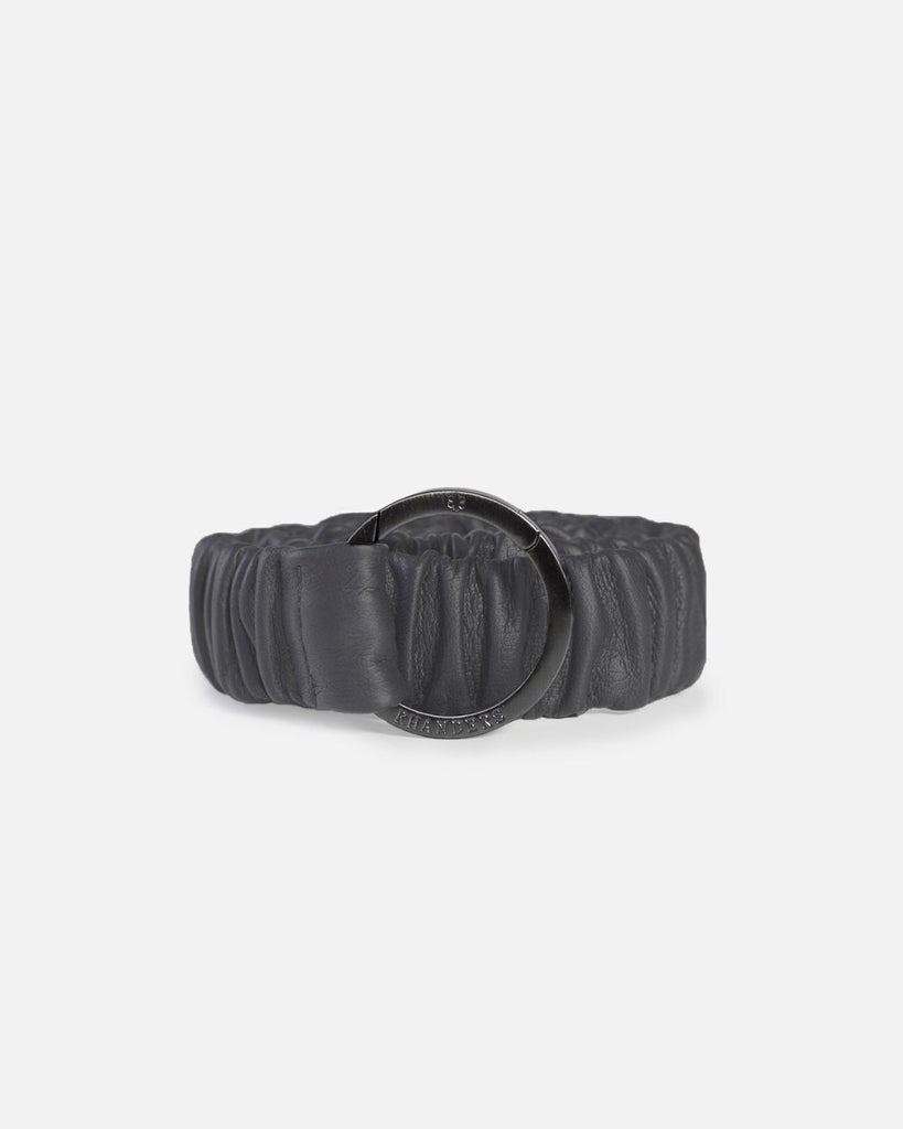 Elastic women's belt with in the colour grey. Can be used in jeans, over the waist of a dress or as a strap for your bag.