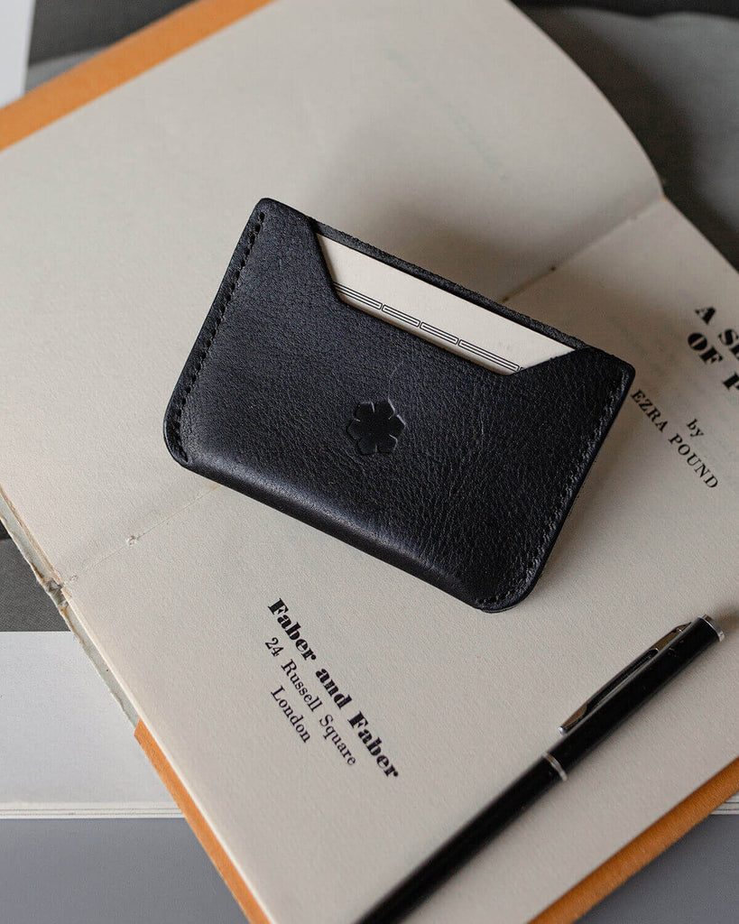 Black card holder for men and women with 2 rooms for creditcards, holds 4-5 cards, RHANDERS.