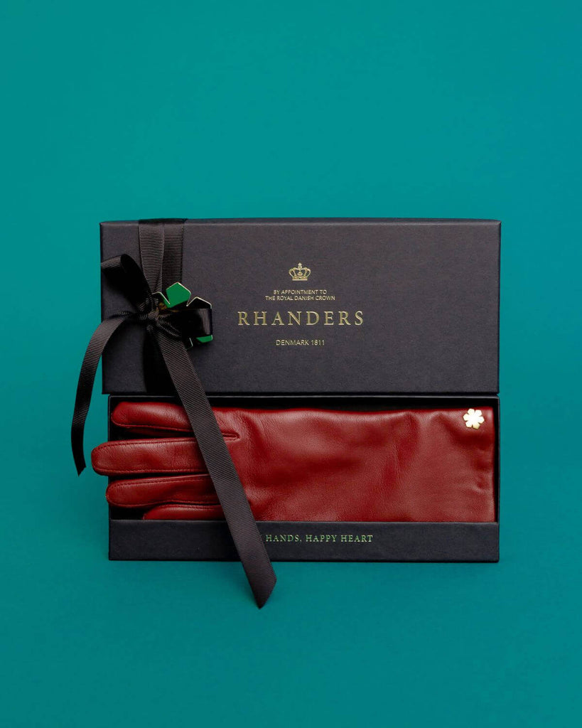 RHANDERS classic leather gloves in deep red, delivered in beautiful branded packaging.