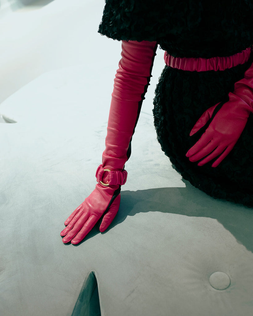 One-size gloves from RHANDERS made from hot pink lamb leather.