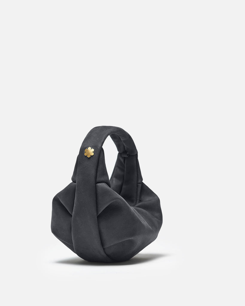 Small and luxurious women's bag made from extraordinary leather awarded the Nordic Swan Ecolabel and the EU Ecolabel.