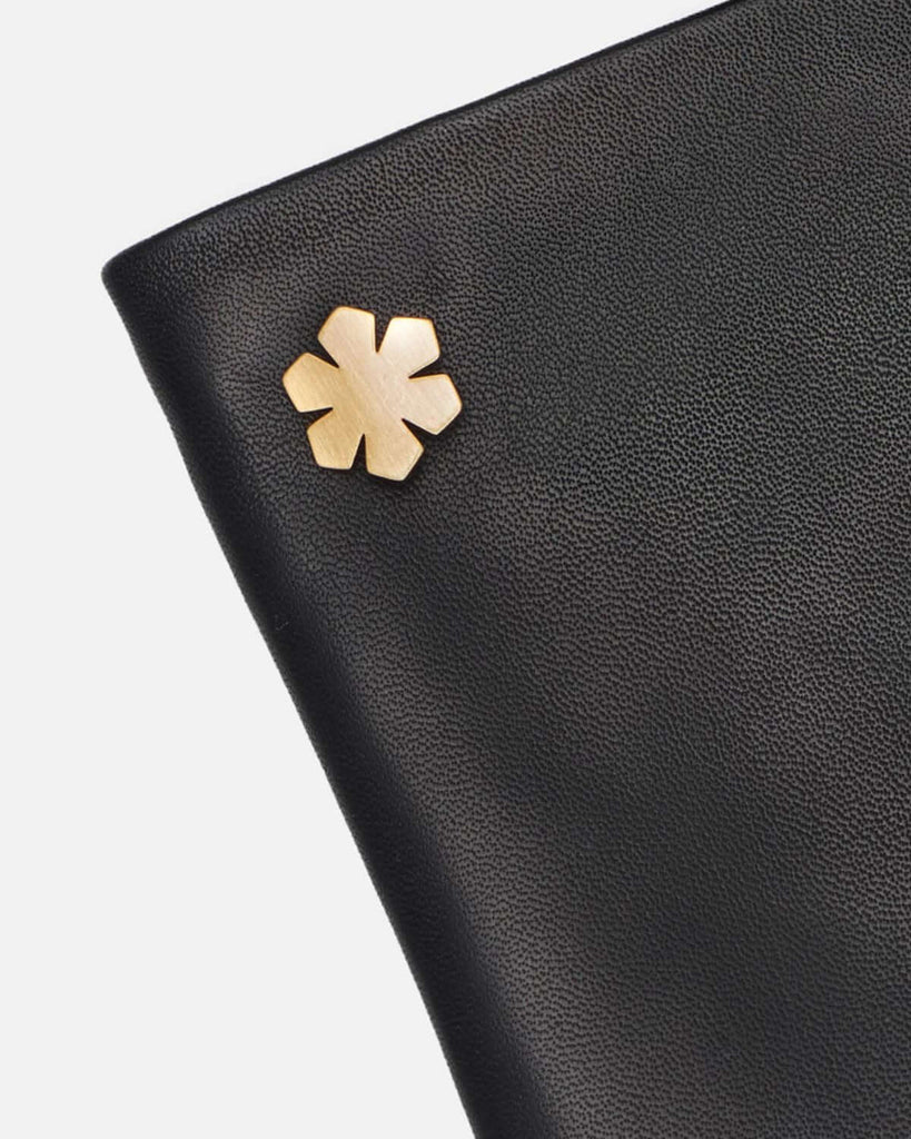 Classic RHANDERS black leather glove with our gold plated kalmus flower.